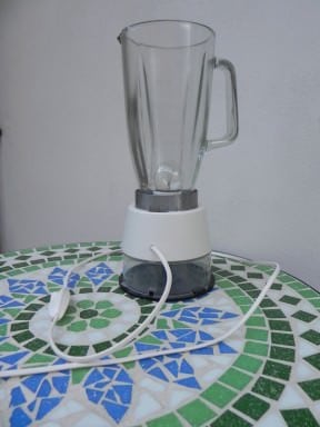 Lamp with a blender and round containers for CDs