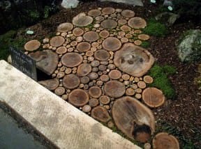 Sliced wood –> garden wood path