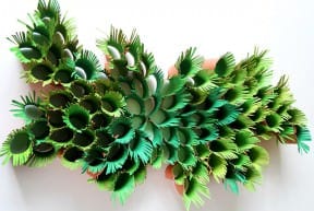 Nature-inspired wall sculpture from paper towel rolls