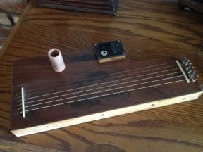 Recycled old piano parts iLap Guitar