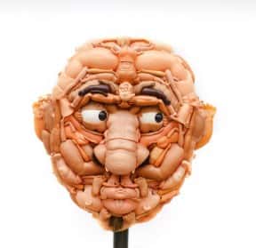 Humanoid faces made of doll parts