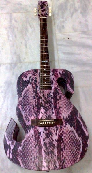 Recycled Musical Instruments 1 • Recycled Art • Recyclart guitar-front