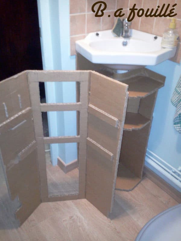 Upcycled Cardboard around a Siphon as Bathroom Furniture 5 • Recycled Cardboard • Recyclart recyclart.org-cardboard-around-a-siphon4