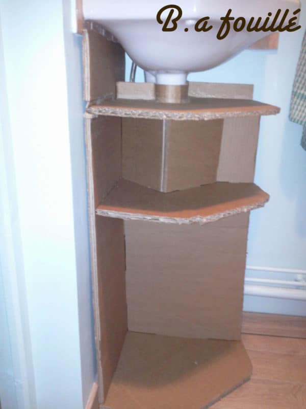 Upcycled Cardboard around a Siphon as Bathroom Furniture 4 • Recycled Cardboard • Recyclart recyclart.org-cardboard-around-a-siphon3
