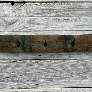 wine-barrel-coat-rack-with-rusty-cast-iron-hooks-1